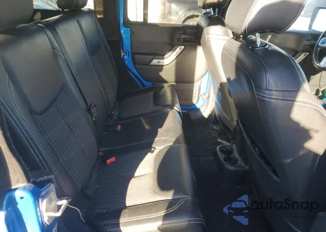 2015 Jeep Wrangler Unlimited Sport z USA, uszkodzony, nr VIN 1C4BJWDG1FL573349